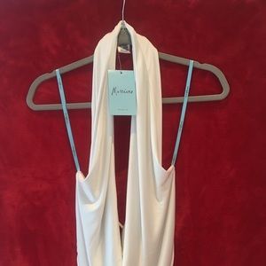White top, open back , holds as halter from neck